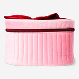 Pink velvet cosmetic bag with a bow from Flying Tiger Copenhagen, perfect for personal care storage.