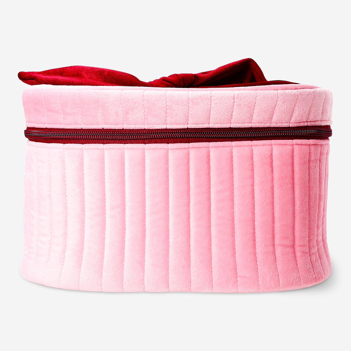 Pink velvet cosmetic bag with a bow from Flying Tiger Copenhagen, perfect for personal care storage.