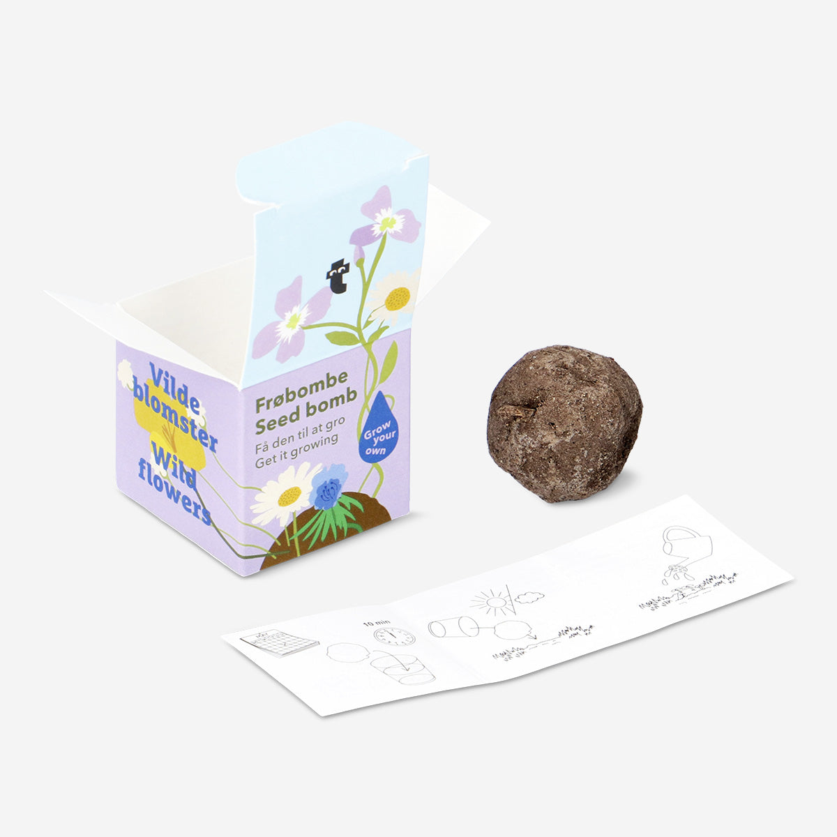 Home seed pack featuring Flying Tiger Copenhagen wildflower mix with colorful flower seeds in a packet.