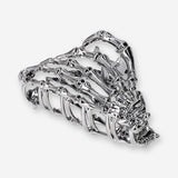 Textile skeleton hair clip with black and white design, by Flying Tiger Copenhagen, featuring a detailed skeleton motif.