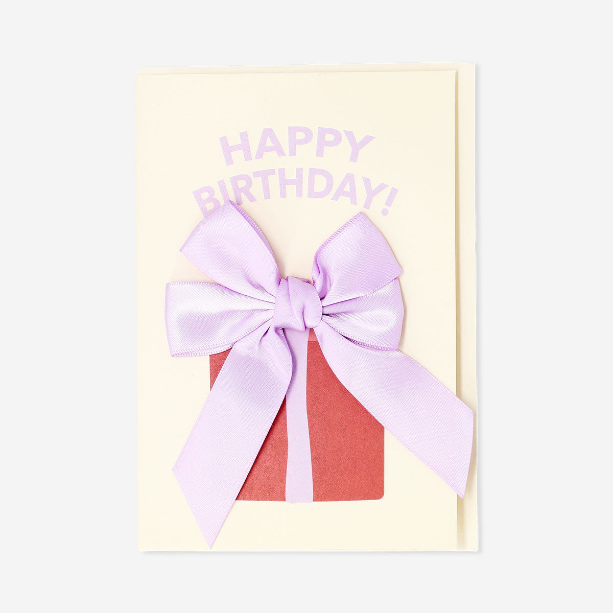 Office birthday card by Flying Tiger Copenhagen featuring a gift with a ribbon design on the front.