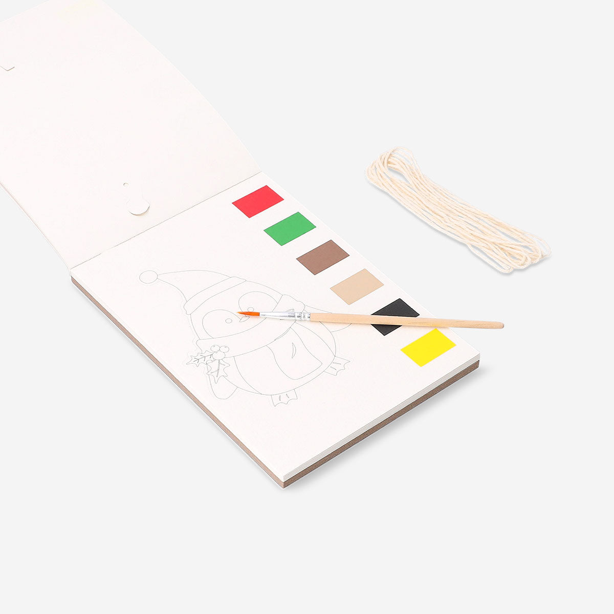 DIY watercolour Christmas garland hobby kit with colorful paper shapes and string for festive holiday decorating by Flying Tiger Copenhagen
