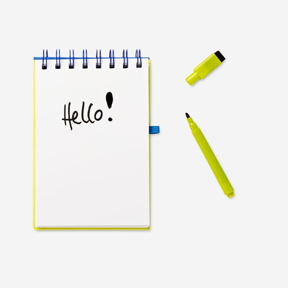 Flying Tiger Copenhagen reusable office notebook with erasable marker, featuring a sleek cover and multiple writable pages.