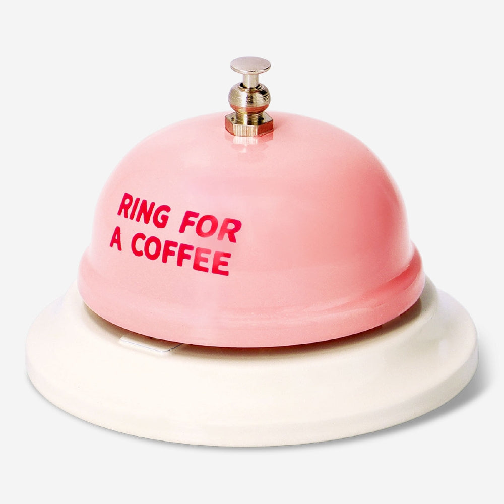 Flying Tiger Copenhagen Bell Ring gadget for coffee, featuring a small, decorative metal bell with a colorful handle.
