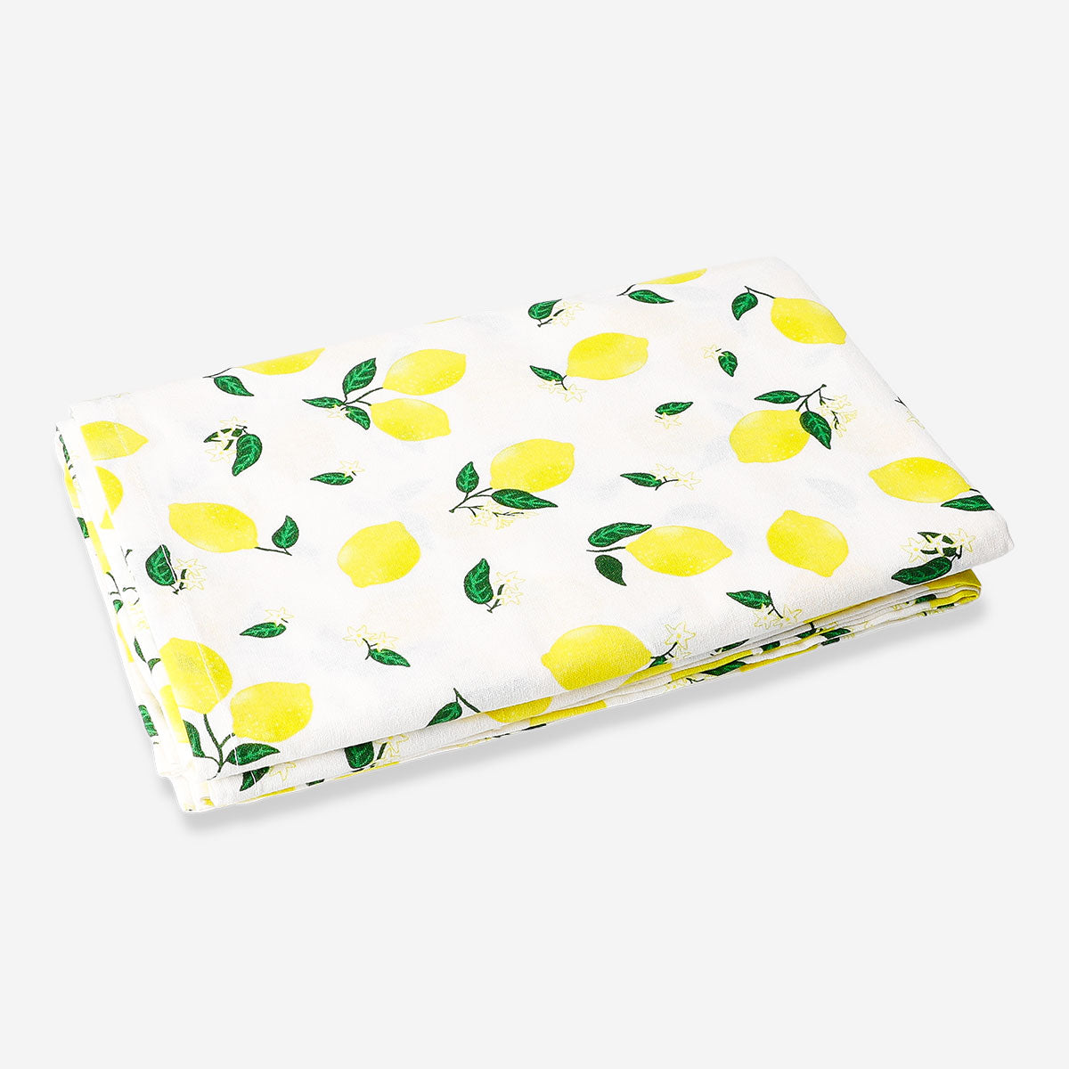 Lemon print tablecloth by Flying Tiger Copenhagen, 140x220 cm, featuring a bright lemon design on a white fabric surface.