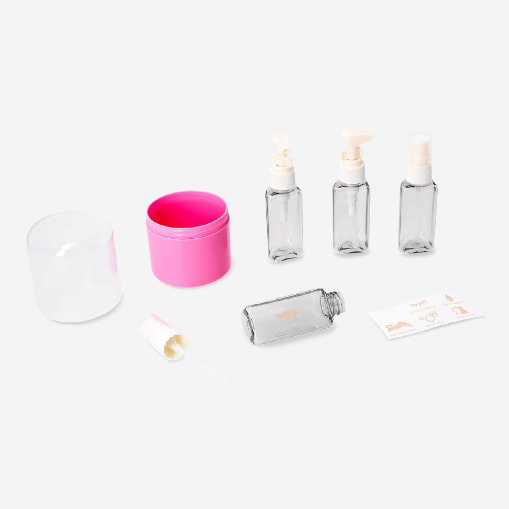 Pink travel set with stickers in a compact case, includes four leisure accessories by Flying Tiger Copenhagen.
