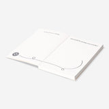 Creative office journal with prompts by Flying Tiger Copenhagen, featuring colorful pages and space for notes and ideas.