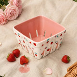 Ceramic kitchen colander with strawberry print by Flying Tiger Copenhagen, featuring a round shape and colorful fruit design.