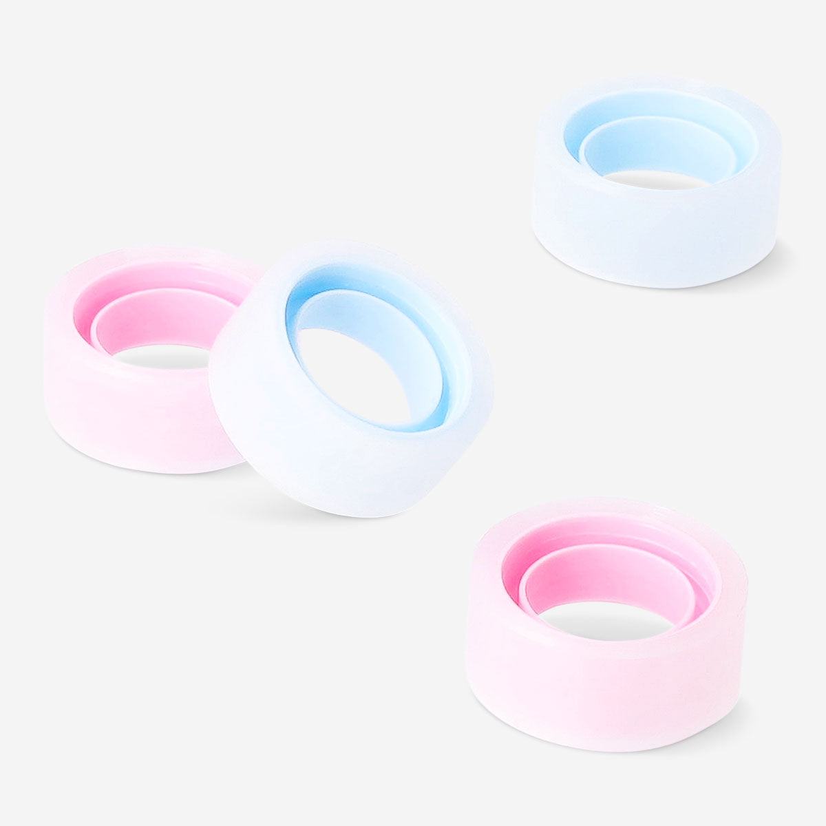 Four transparent office tape rolls from Flying Tiger Copenhagen arranged in a pack, ideal for everyday office use.