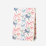 Set of three office paper bags with decorative bows by Flying Tiger Copenhagen, featuring kraft paper and elegant bow accents.