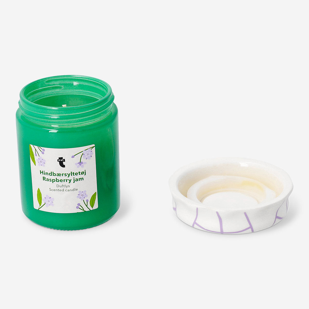 Flying Tiger Copenhagen raspberry jam-shaped candle with home fragrance, designed to resemble a jam jar for decorative use.