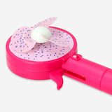 Flying Tiger Copenhagen mist spray fan with a vibrant dragon fruit design, compact gadget for cooling and refreshing airflow.