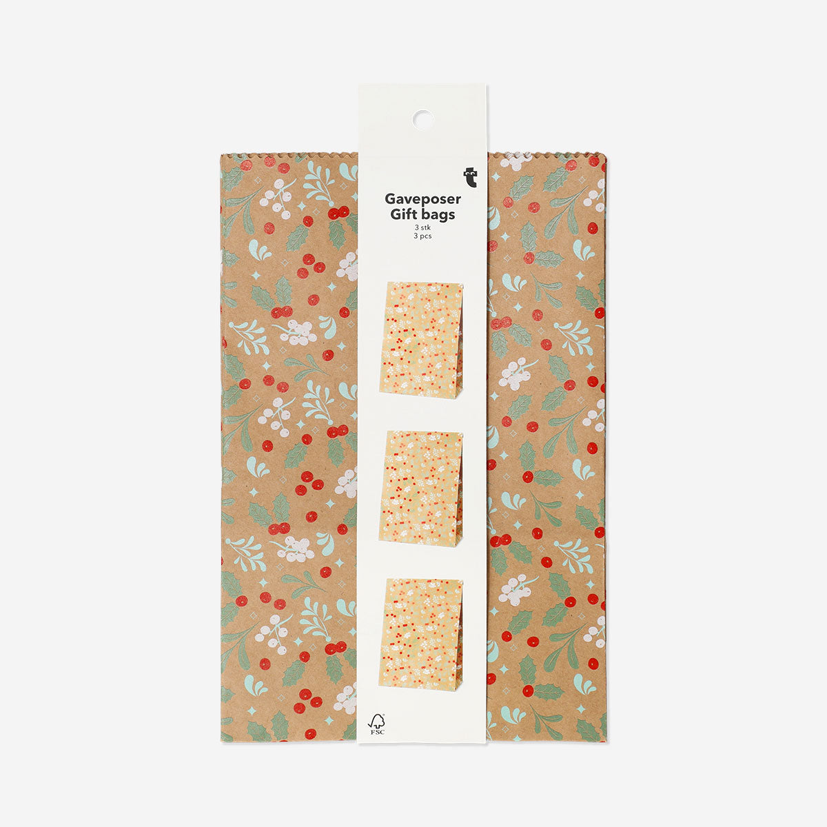 Set of three Flying Tiger Copenhagen paper gift bags with festive holly print, ideal for holiday gift wrapping and office celebrations.