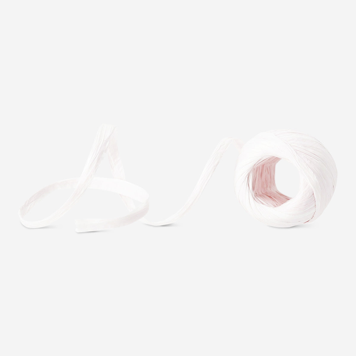 Light pink twisted paper ribbon for office decoration, 20 meters, by Flying Tiger Copenhagen, shown in a close-up image.