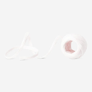 Light pink twisted paper ribbon for office decor, 20 meters, from Flying Tiger Copenhagen, shown rolled out with some twists visible.
