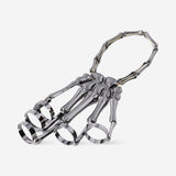 Textile skeleton hand jewelry by Flying Tiger Copenhagen featuring detailed skeleton hand design on soft fabric.