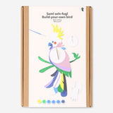DIY tropical bird hobby kit from Flying Tiger Copenhagen with paint and materials for creating a colorful bird craft.