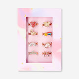 Set of 8 children's adjustable textile rings featuring colorful fairytale motifs, perfect for kids' accessories.