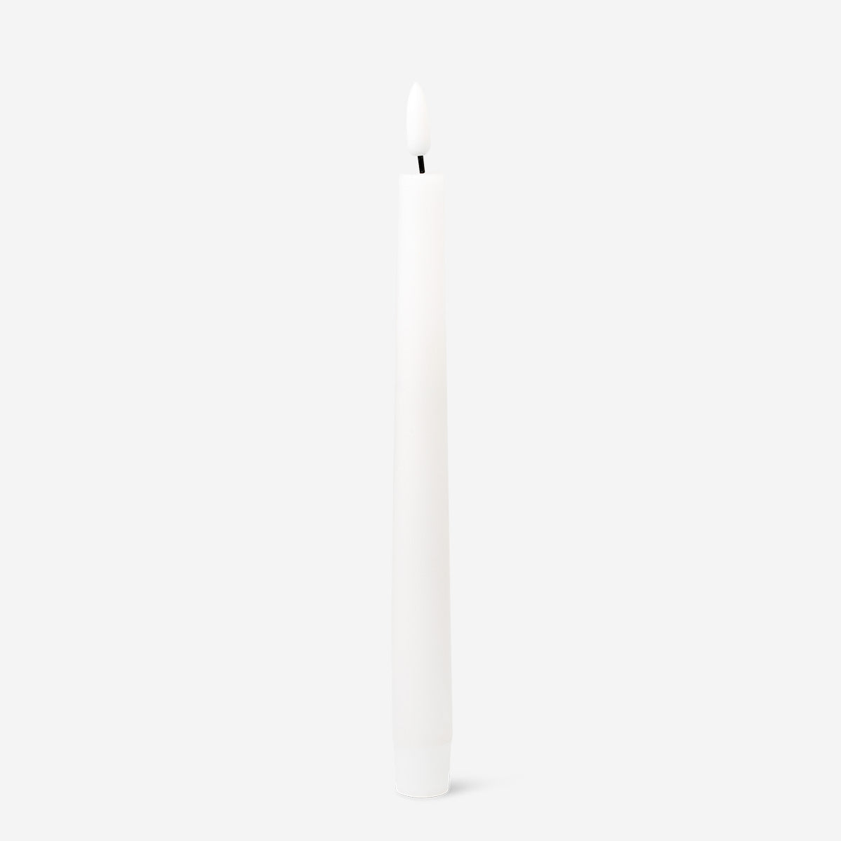 White LED dinner candle from Flying Tiger Copenhagen, sleek home lighting candle with realistic flickering effect.