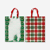 Two festive Christmas print gift bags from Flying Tiger Copenhagen, coated for durability, ideal for office gift wrapping.