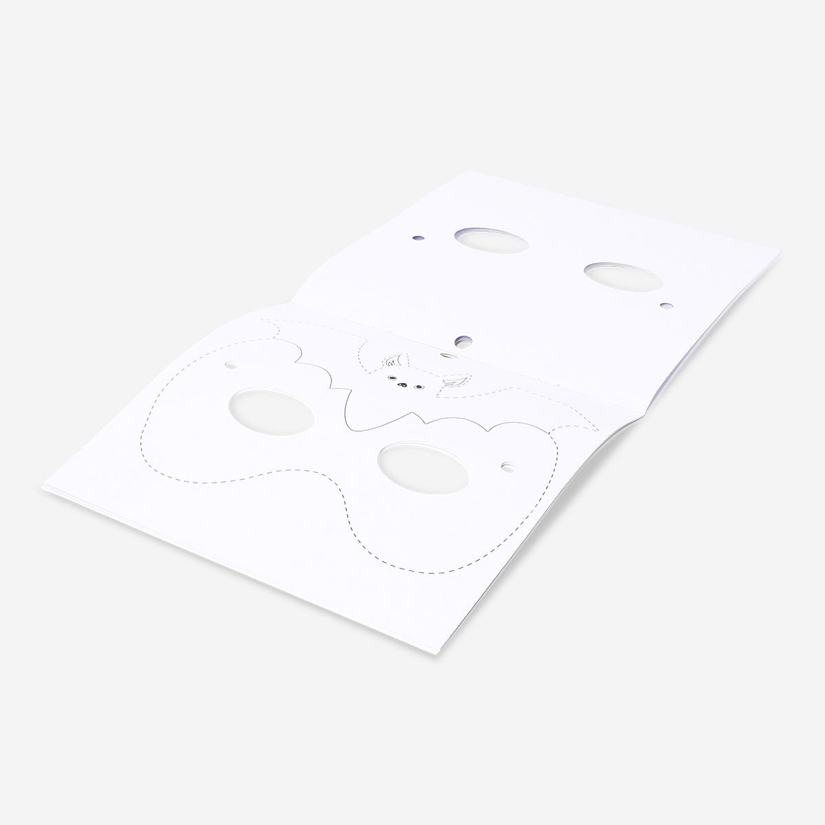 Coloring book for Halloween masks by Flying Tiger Copenhagen featuring spooky mask illustrations for kids' Halloween activities.