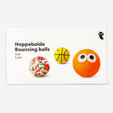 Three colorful bouncing balls toy by Flying Tiger Copenhagen, shown in a playful arrangement on a plain background.