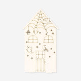 Flying Tiger Copenhagen DIY double-sided wooden house for Halloween and Christmas, perfect for holiday craft projects.