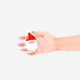 Flying Tiger Copenhagen pocket heat pad featuring a festive Santa design, compact gadget for warmth and comfort.