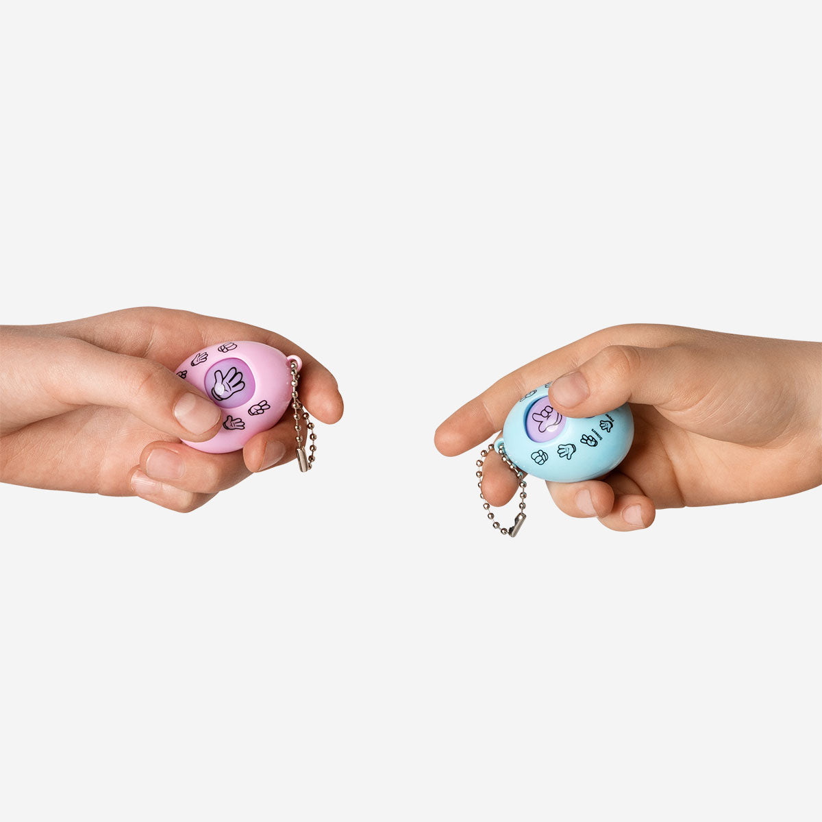 Digital rock-paper-scissors game key rings by Flying Tiger Copenhagen, featuring colorful game-themed keychain accessories.