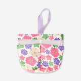 Flying Tiger Copenhagen floral hanging bathroom organiser with multiple pockets for storage and decor.