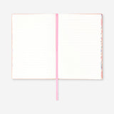 A5 soft cover floral notebook from Flying Tiger Copenhagen with colorful flower patterns on the cover.