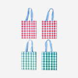 Set of four checkered gift bags from Flying Tiger Copenhagen, ideal for office presents or special occasions.
