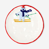 Decorative 21 cm ceramic plate with embossed skiing polar bear design, ideal for kitchen decor by Flying Tiger Copenhagen.
