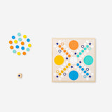 Wooden Ludo game by Flying Tiger Copenhagen with colorful game pieces and a wooden game board for family fun.