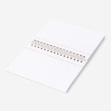 Spiral bound Flying Tiger Copenhagen Office flash cards stacked with colorful tabs and printed labels for quick reference.