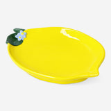 Lemon-shaped ceramic serving plate from Flying Tiger Copenhagen, 14 cm size, ideal for kitchen use and food presentation.