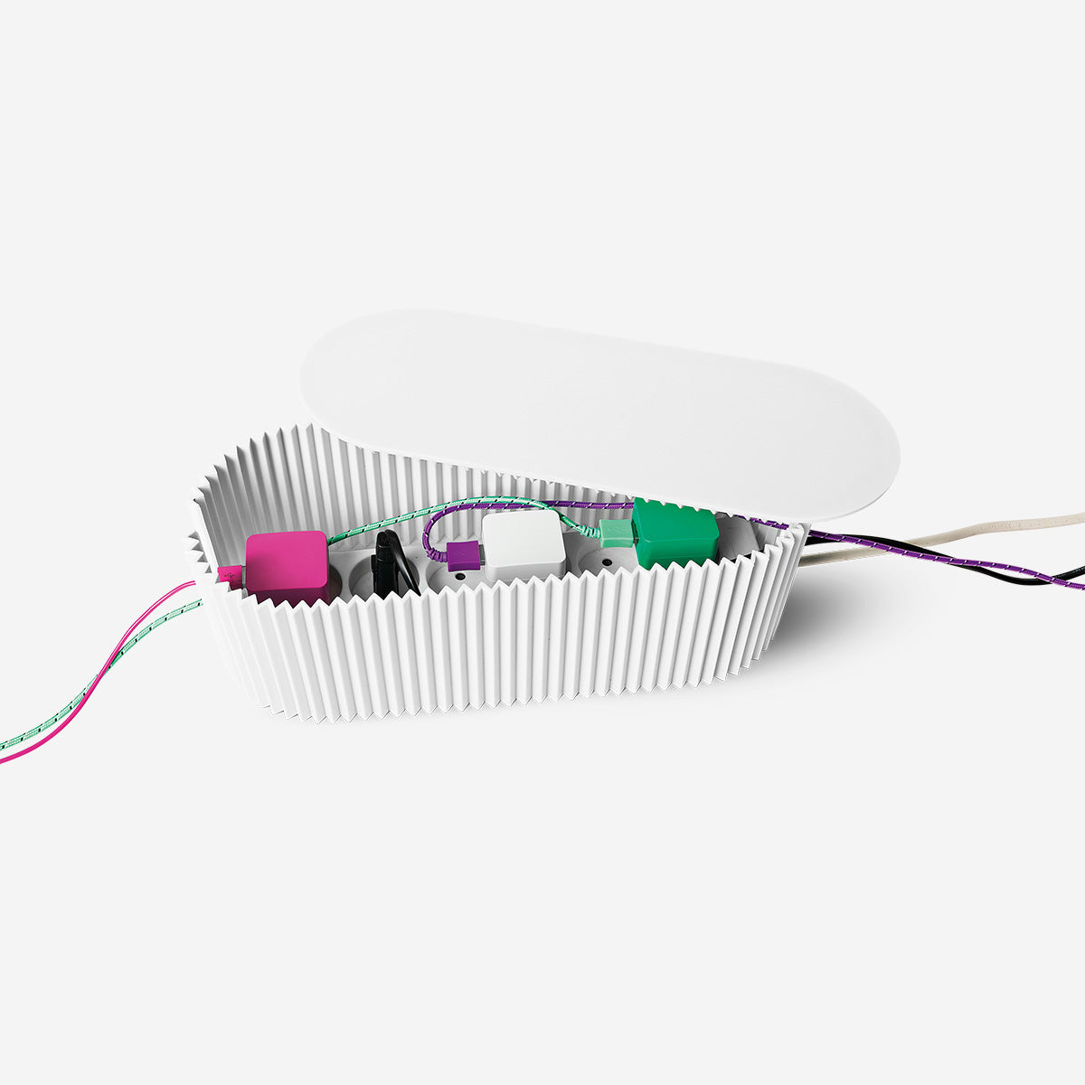 White cable tidy unit from Flying Tiger Copenhagen for organizing and managing home electrical cords and cables.