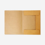 A4 craft paper document folder with elastic closure from Flying Tiger Copenhagen for organizing papers in an office setting.