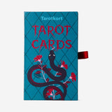 Flying Tiger Copenhagen Tarot cards game with colorful illustrated deck spread out on a table.