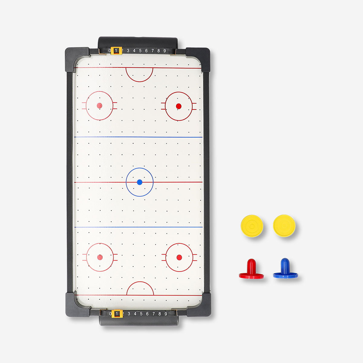 Flying Tiger Copenhagen air hockey arcade game with two paddles and puck on a sleek playing surface.