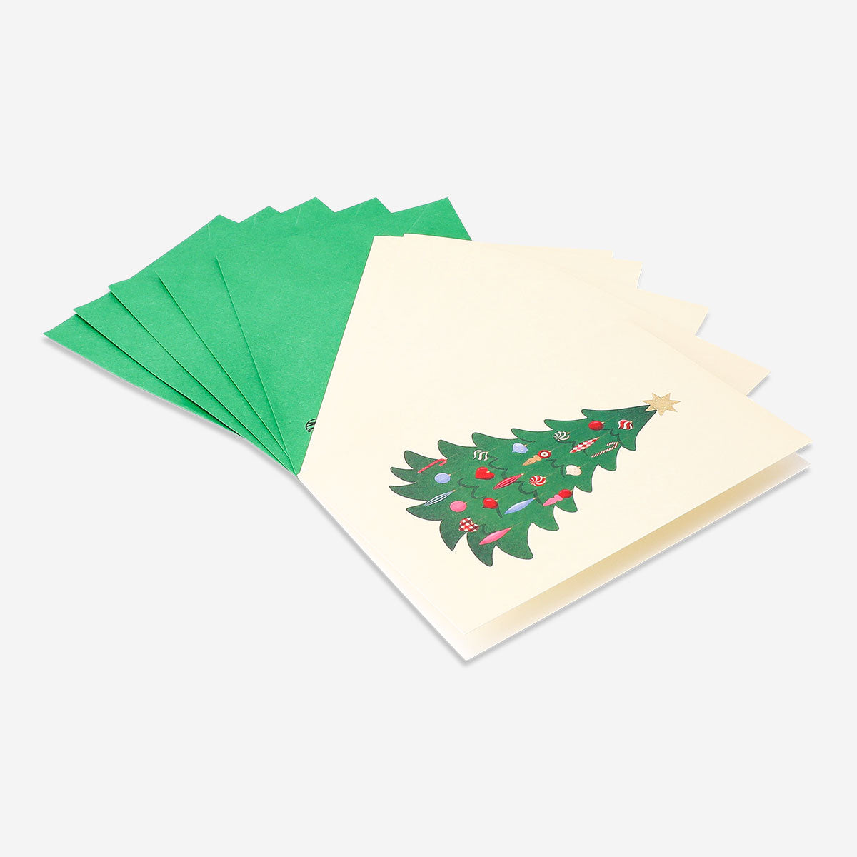 Set of five Flying Tiger Copenhagen Christmas cards with matching envelopes, featuring festive designs and bright holiday colors.
