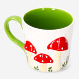 White 450ml ceramic mug with embossed mushroom design, perfect for kitchen use, by Flying Tiger Copenhagen.