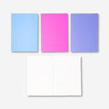 Set of four Flying Tiger Copenhagen A5 office notebooks with colorful covers and lined pages for note-taking and organization.
