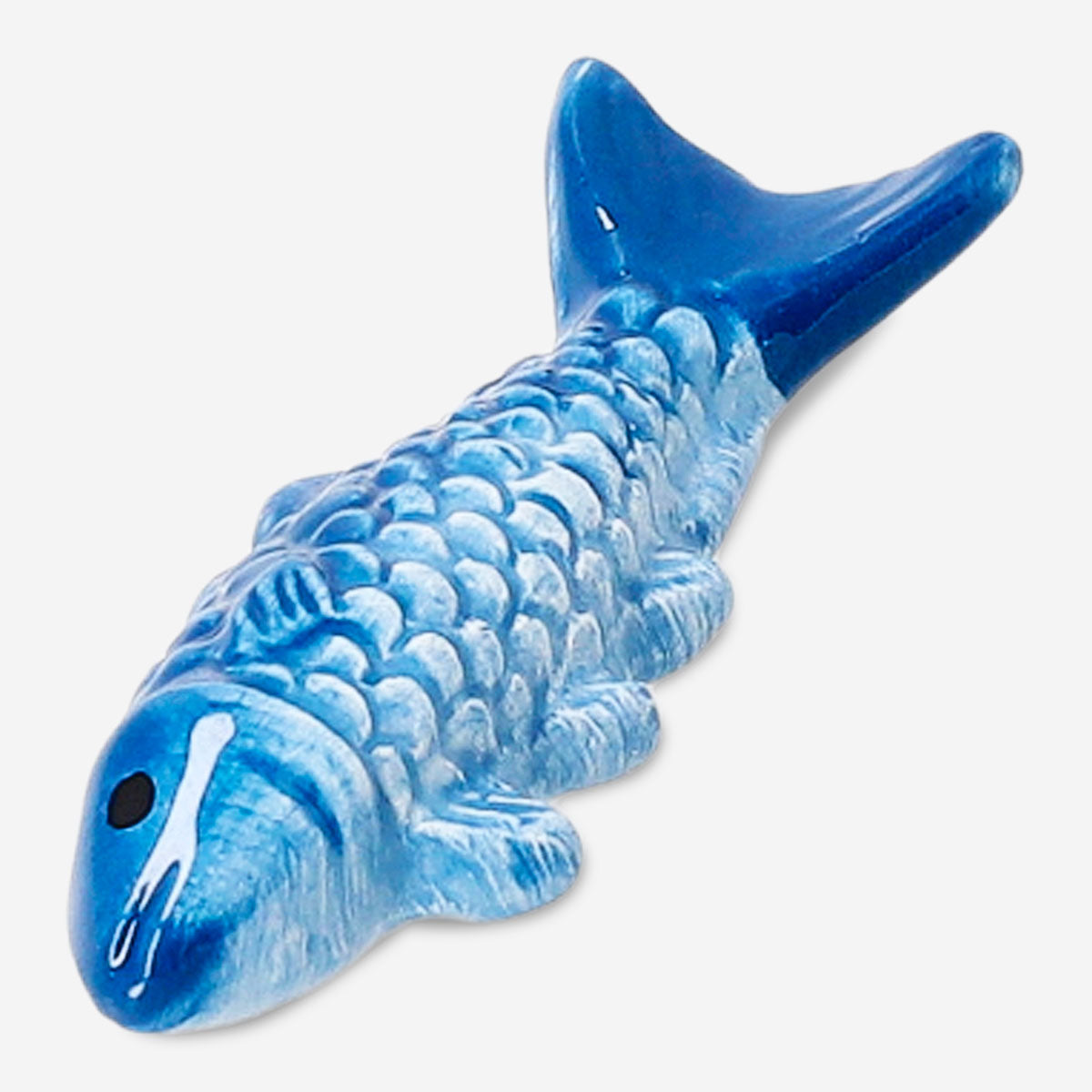 Blue fish chopstick holder for kitchen, featuring a playful design, from Flying Tiger Copenhagen, ideal for organizing chopsticks.