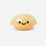 Flying Tiger Copenhagen Press Me Toy Dumpling gadget showing a soft, squishy dumpling-shaped stress relief toy in bright colors.