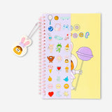 Flying Tiger Copenhagen A5 Monster Candy notebook with charm, featuring colorful monster illustrations and a decorative charm attachment.