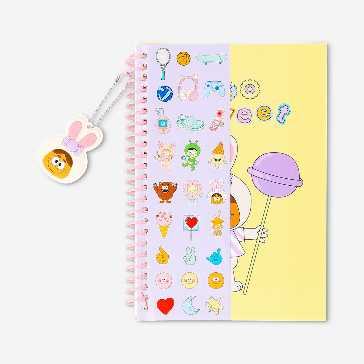 Flying Tiger Copenhagen A5 Monster Candy notebook with charm, featuring colorful monster illustrations and a decorative charm attachment.