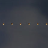 Flying Tiger Copenhagen snowflake string lights for home decor, featuring festive snowflake-shaped LED lights.