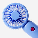 Blue handheld gadget fan with three adjustable settings, compact and portable for personal cooling by Flying Tiger Copenhagen.