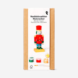 DIY wooden nutcracker hobby kit by Flying Tiger Copenhagen with natural wood finish and intricate nutcracker design.